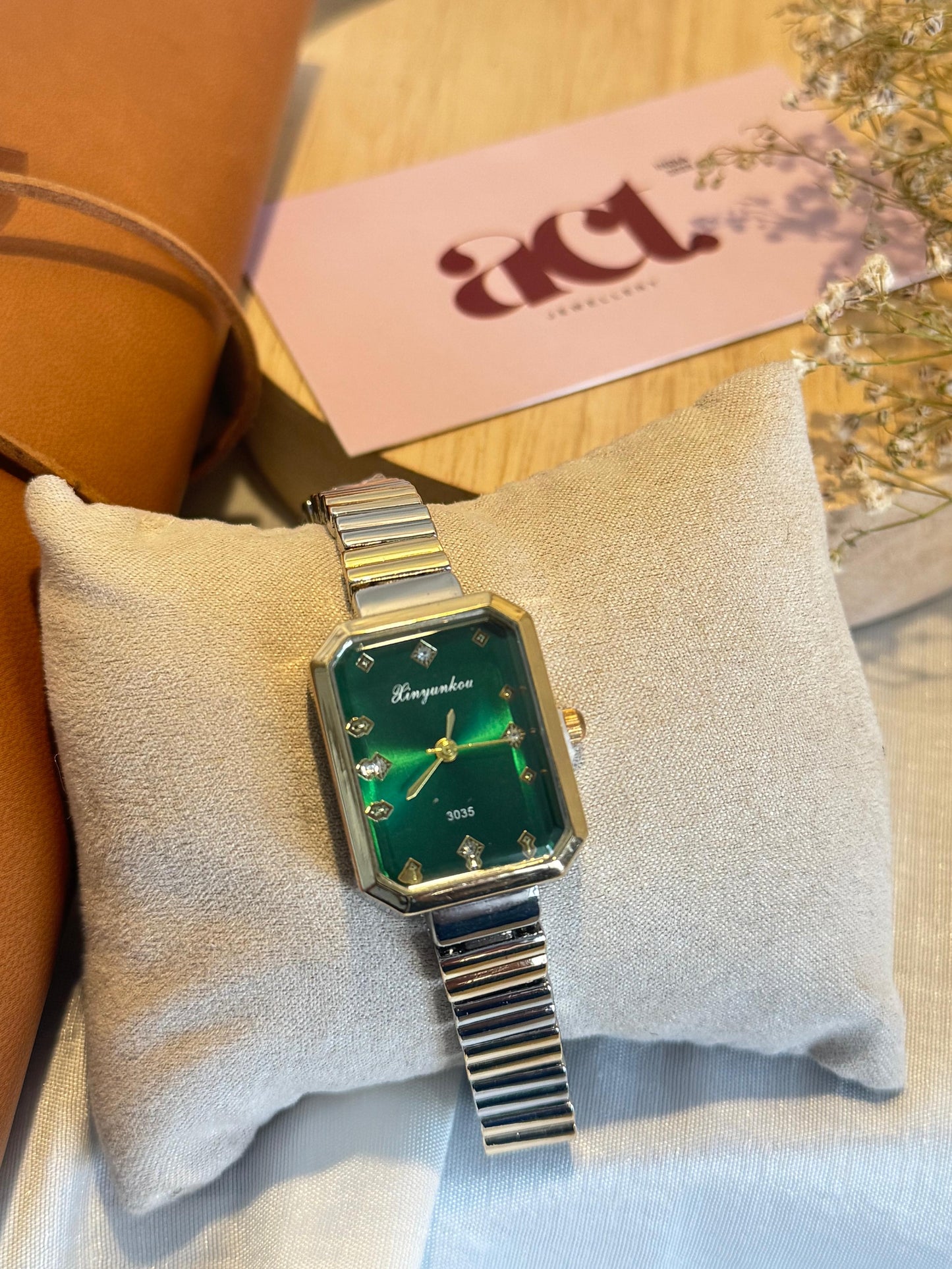 Emerald Dial Statement Watch