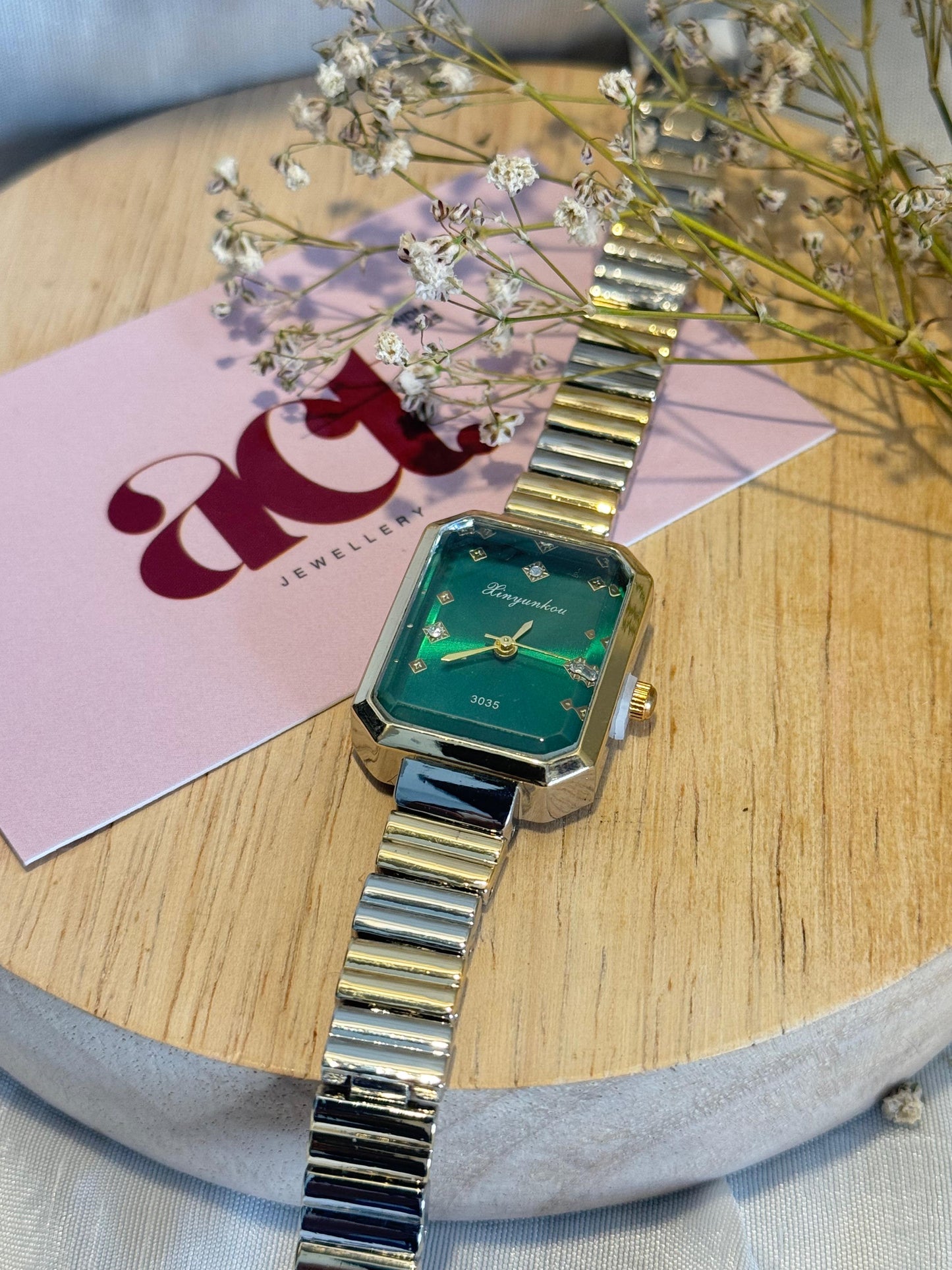 Emerald Dial Statement Watch